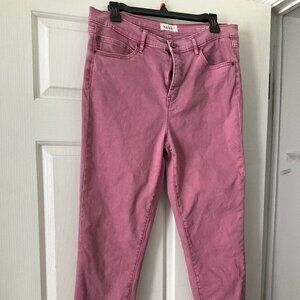 Rose colored slightly distressed ankle jeans